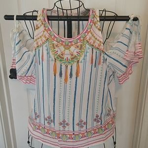 Cute multi color, ladies large pullover shirt.